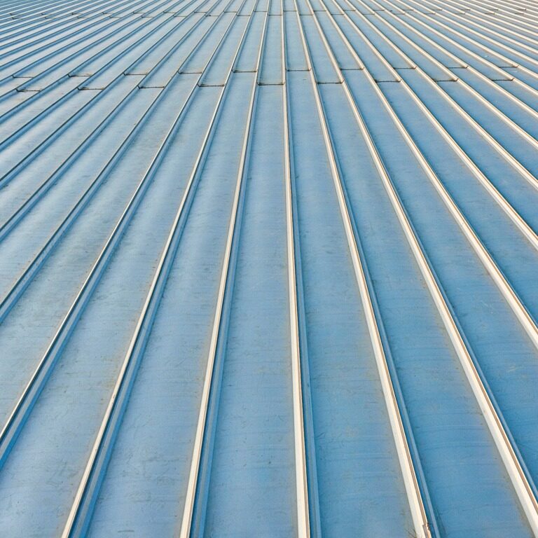 Orange Shingles on Green House